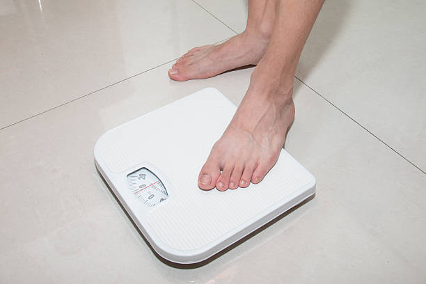 istock Closeup of a Asians weighed 519424624