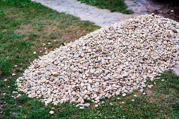 istock pile of stones on the grass 519424730
