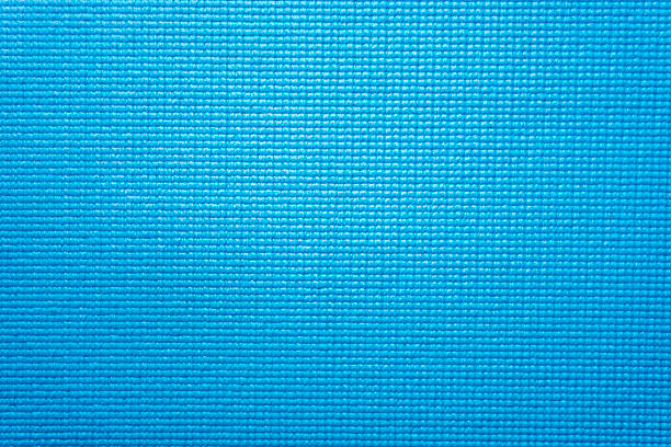 Blue yoga mat texture background Blue yoga mat texture background mat stock pictures, royalty-free photos & images