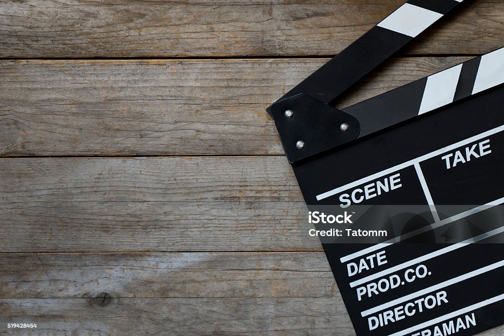 movie clapper on wood table Film Slate Stock Photo