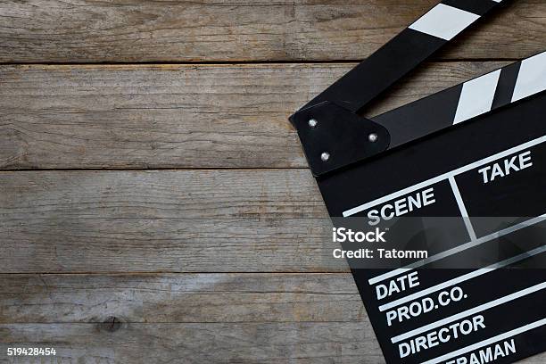 Movie Clapper On Wood Table Stock Photo - Download Image Now - Film Slate, Hollywood - California, Industry