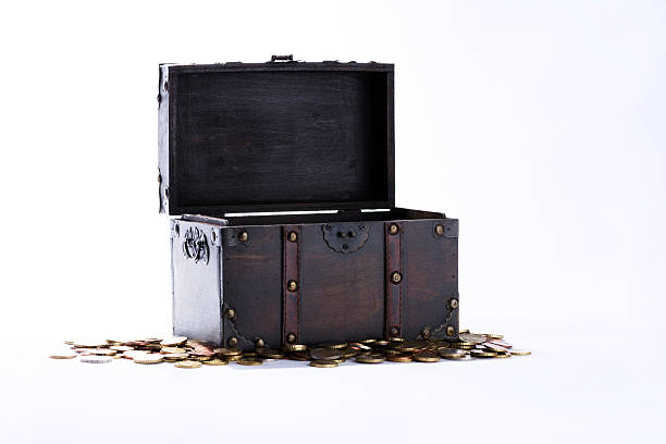istock Treasure chest with coins against white background 519429222