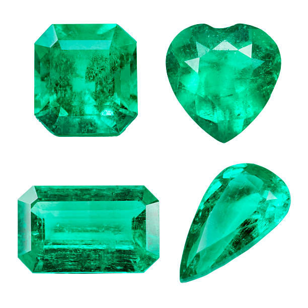 Emerald isolated on white background Emerald isolated on white background stone object stock pictures, royalty-free photos & images