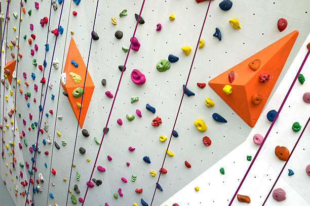 istock Indoor rock climbing wall background 519430172