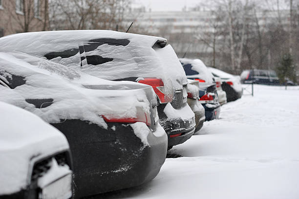 istock snow-covered cars. snow has covered machine 519430326