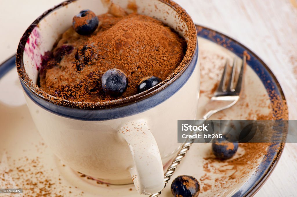 Blueberry  Microwave mug  Muffin Blueberry sweet  Microwave mug Muffin . Selective focus Baked Stock Photo