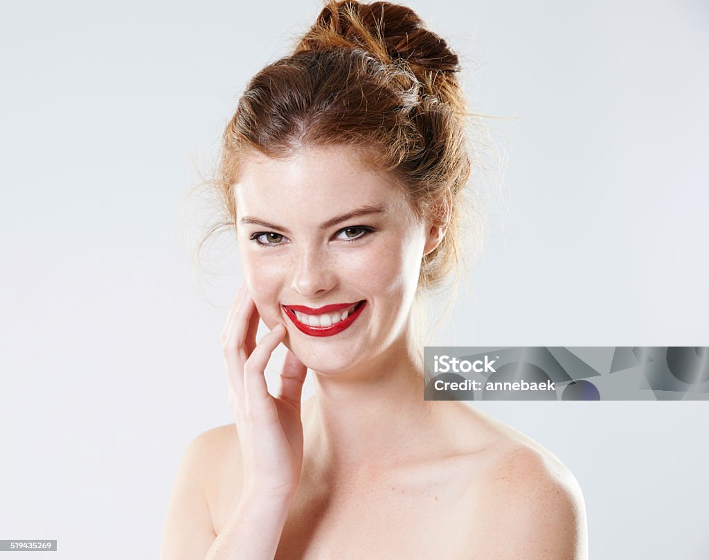 Brimming with confidence Cropped studio portrait of a beautiful young woman with bare shoulders isolated on gray 20-29 Years Stock Photo