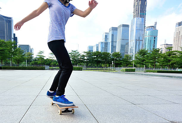 istock skateboarding woman 519435903