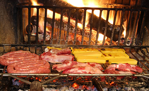 istock beef and pork on the grill 519437125