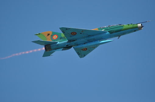 Cluj Napoca, Romania - May, 17, 2013: MIG 21 LANCER fighter plane performs a demonstration flight on the Romanian Air Fest