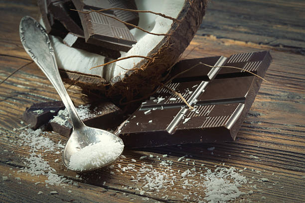 Chocolate and coconut on old table