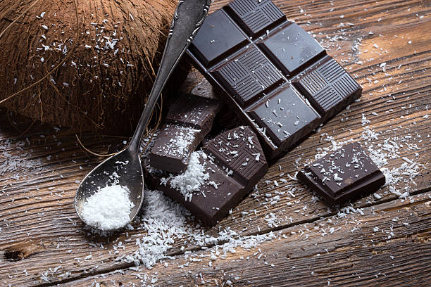Chocolate and coconut on old table