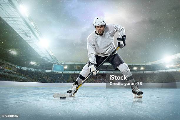 Ice Hockey Player On The Ice Open Stadium Stock Photo - Download Image Now - Ice Hockey, Helmet, Stadium