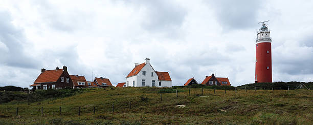 istock Lightouse and Houses on Texel 519454585