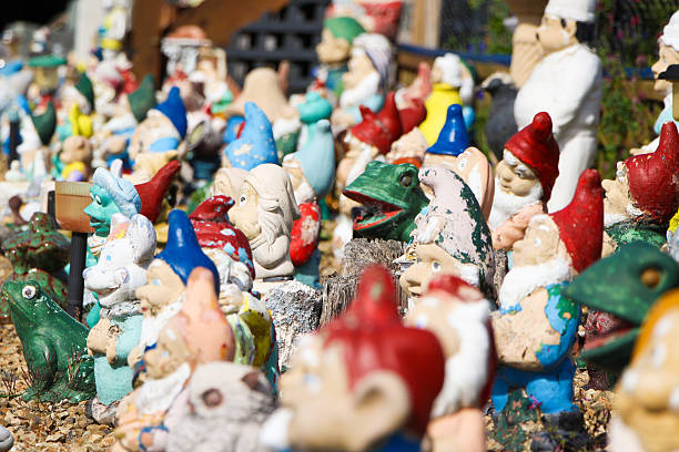Garden gnome ornaments fill this front yard on a deserted backroad