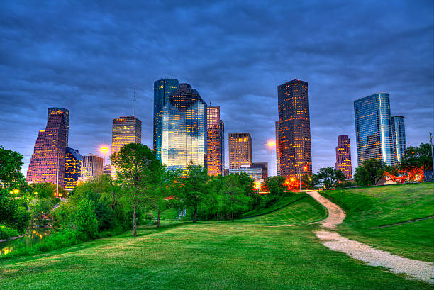 istock Houston Texas modern skyline at sunset twilight from park 519457021