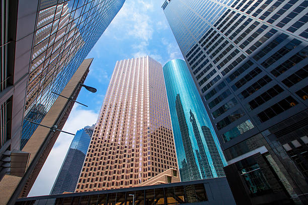 istock Houston downtown skyscrapers disctict blue sky mirror 519457295