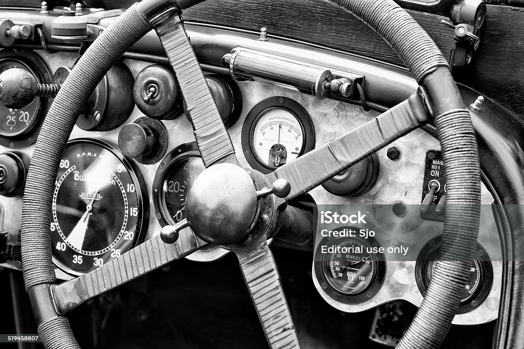 Vintage Bentley race car dashboard Jüchen, Germany - August 1, 2014: Vintage 1920s Bentley race car brushed aluminium dashboard with speedometer on display during the 2014 Classic Days event at Schloss Dyck. Bentley Stock Photo