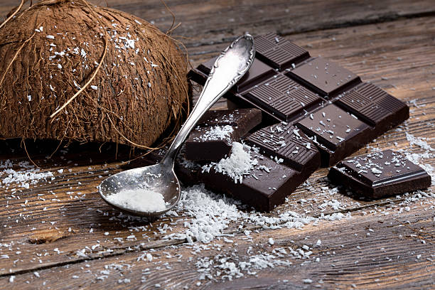 Chocolate and coconut on old table