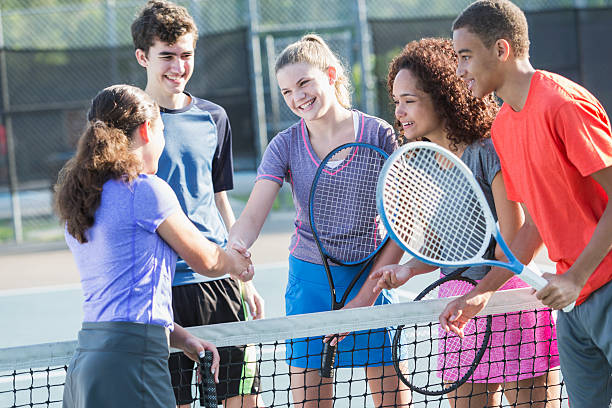 istock Teenagers playing tennis 519459707
