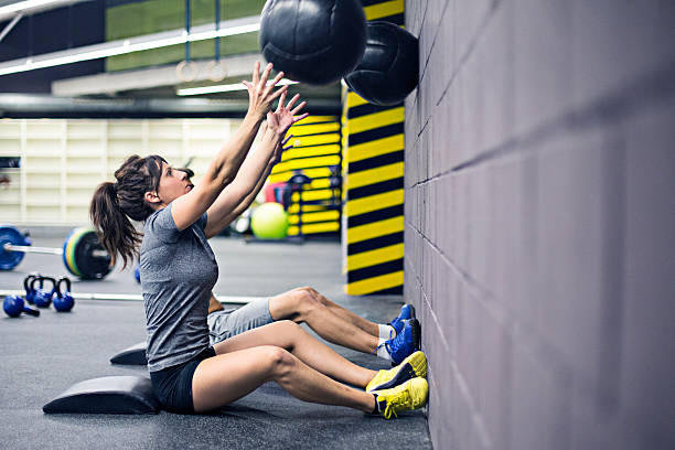 istock Practising with the medicine balls on the wall 519459947
