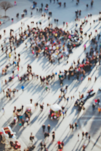 istock Blurred crowd of people 519460626