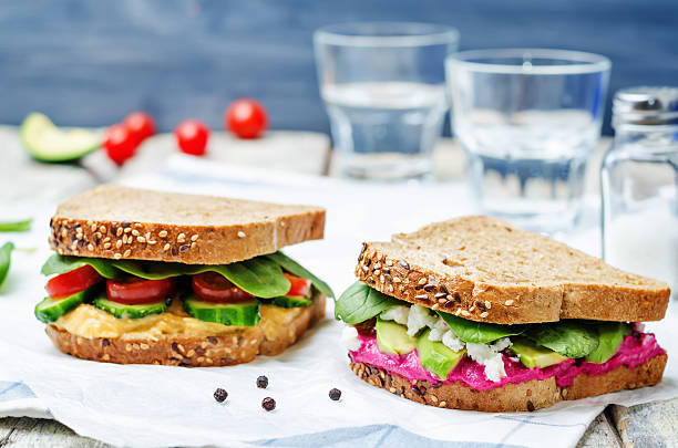 istock rye sandwiches with carrots and beetroot hummus and vegetables 519461162