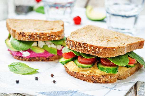 istock rye sandwiches with carrots and beetroot hummus and vegetables 519461228