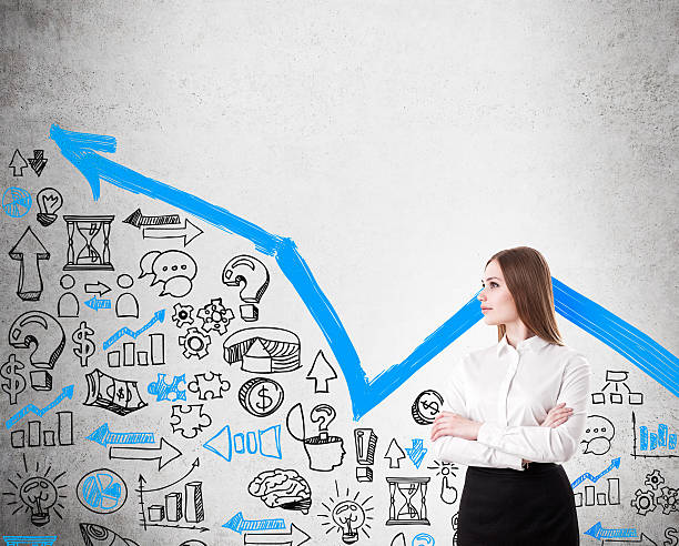 istock Businesswoman at concrete wall 519462688