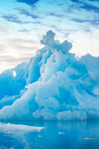 Bizarre shaped Iceberg in the arctic sea; Southern Greenland. XXL image.
