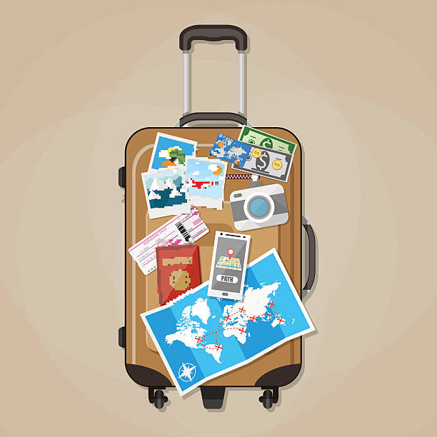 istock Tourist equipment on brown travel suitcase 519464610