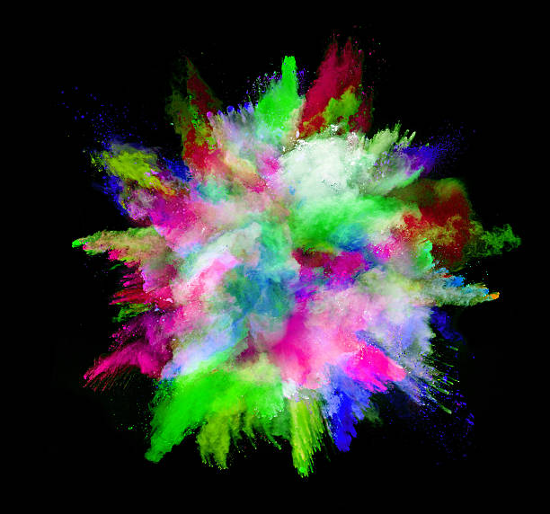 istock Explosion of colored powder on black background 519465394