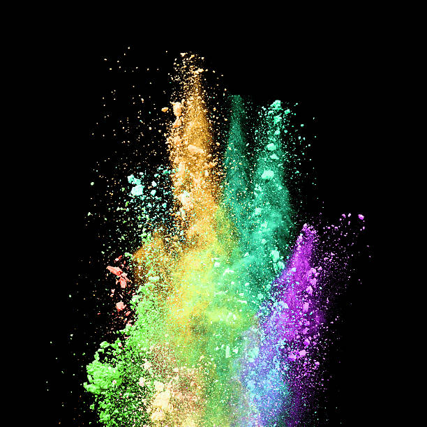 istock Explosion of colored powder on black background 519465664