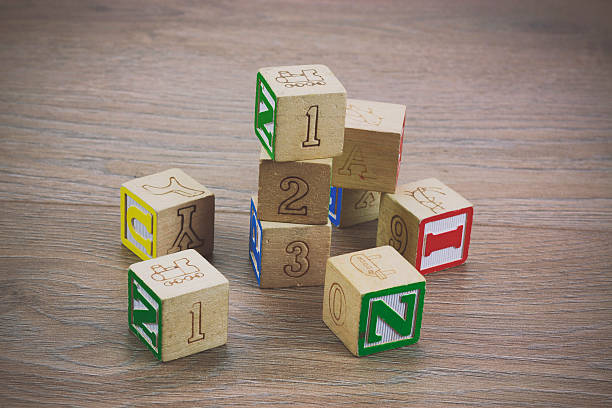istock Childrens blocks on a wooden floor 519466266