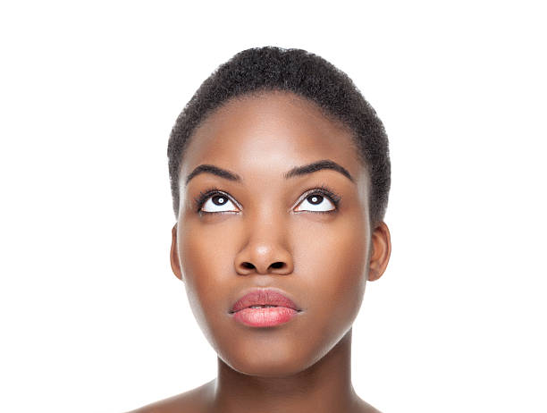 Beautiful black woman looking up