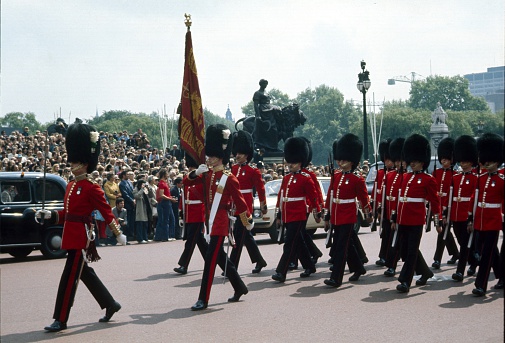 London, England, United Kingdom, May 29, 1977. Changing of the Queen`s Gard. Band of the British Grenadier Guards during march of the guards at Buckingham Palace.