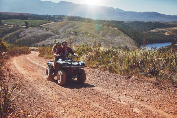 istock Young couple enjoying off road vehicle ride 519467662