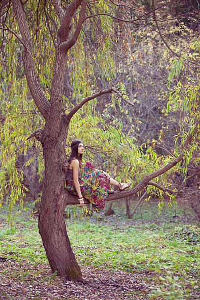 istock Hippie Girl and tree 519468134