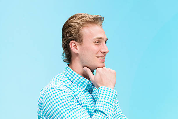 istock Smiling casual man looking away 519468282