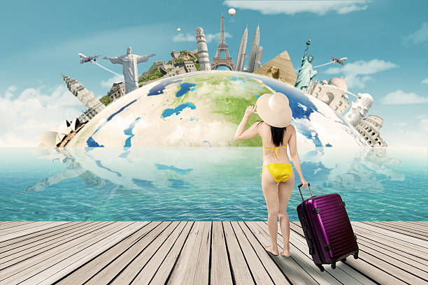 istock Tourist with bikini and the world landmark 519468294