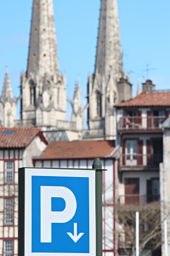 parking sign in front of bayonne cathedral