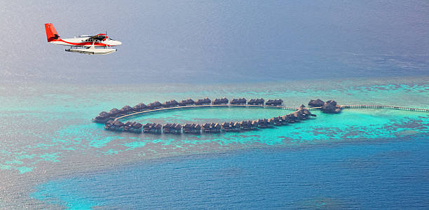 istock Sea plane flying above Maldives islands 519470254