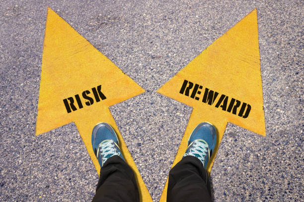 istock Feet and words  Risk and Reward 519470586