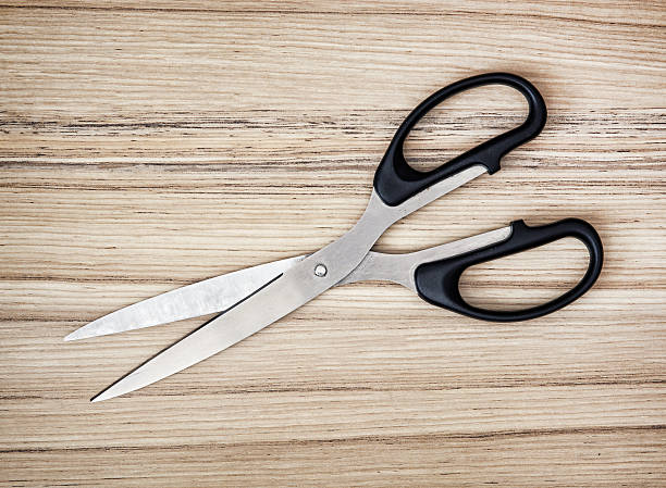 istock Scissors on the wooden background, office supplies 519472382