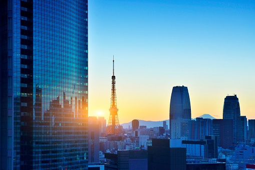 Tokyo tower and city skyscraper at sunset, Japan.