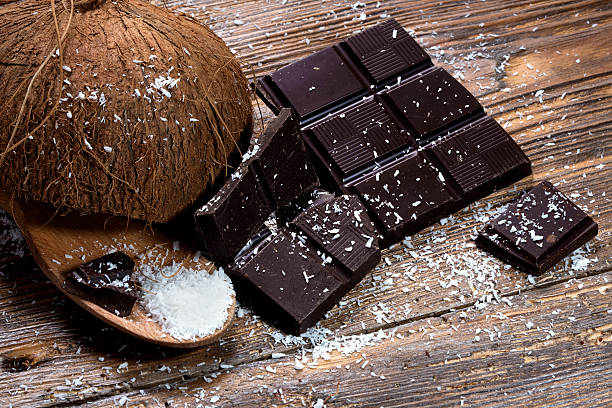 Chocolate and coconut on old table