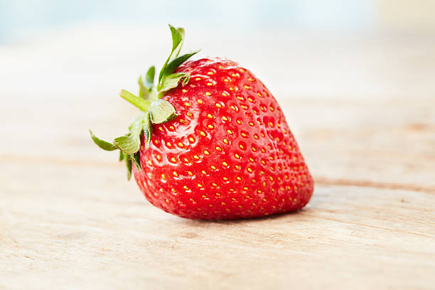 istock Fresh strawberry wooden table 519474036