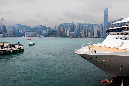 Ship at Kowloon and Hong Kong Island skyline, China,