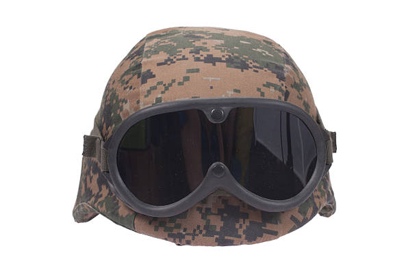 istock us marines kevlar helmet with camouflage cover and protective goggles 519486105