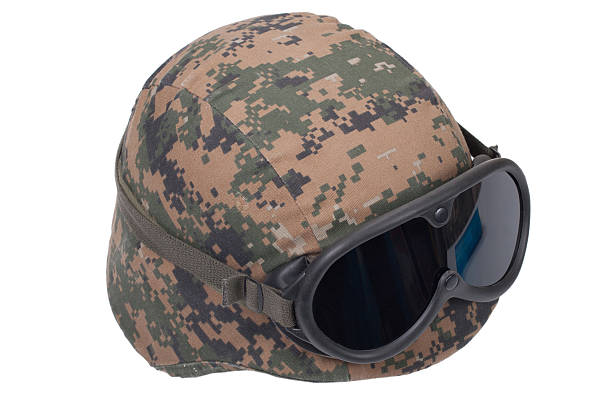 istock us marines kevlar helmet with camouflage cover and protective goggles 519486165